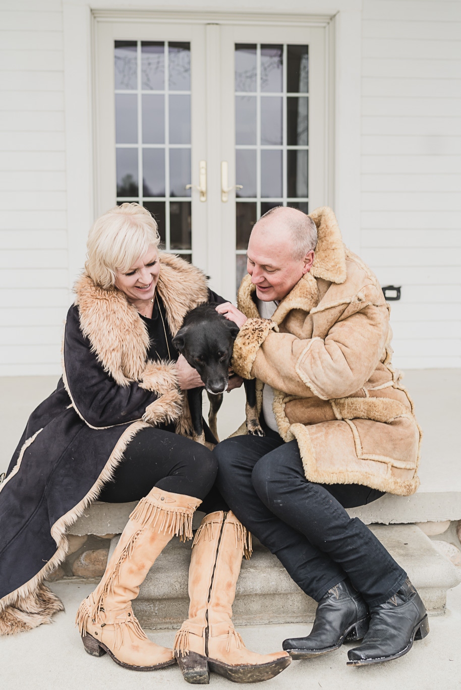 Snowy winter engagement photos in Romeo, Michigan provided by Kari Dawson, top-rated Southeastern Michigan wedding and engagement photographer.
