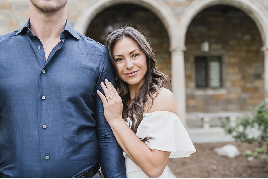 Classic Ann Arbor Engagement photos at the Law Quad with stunning architecture and blooming trees by Kari Dawson Photography.