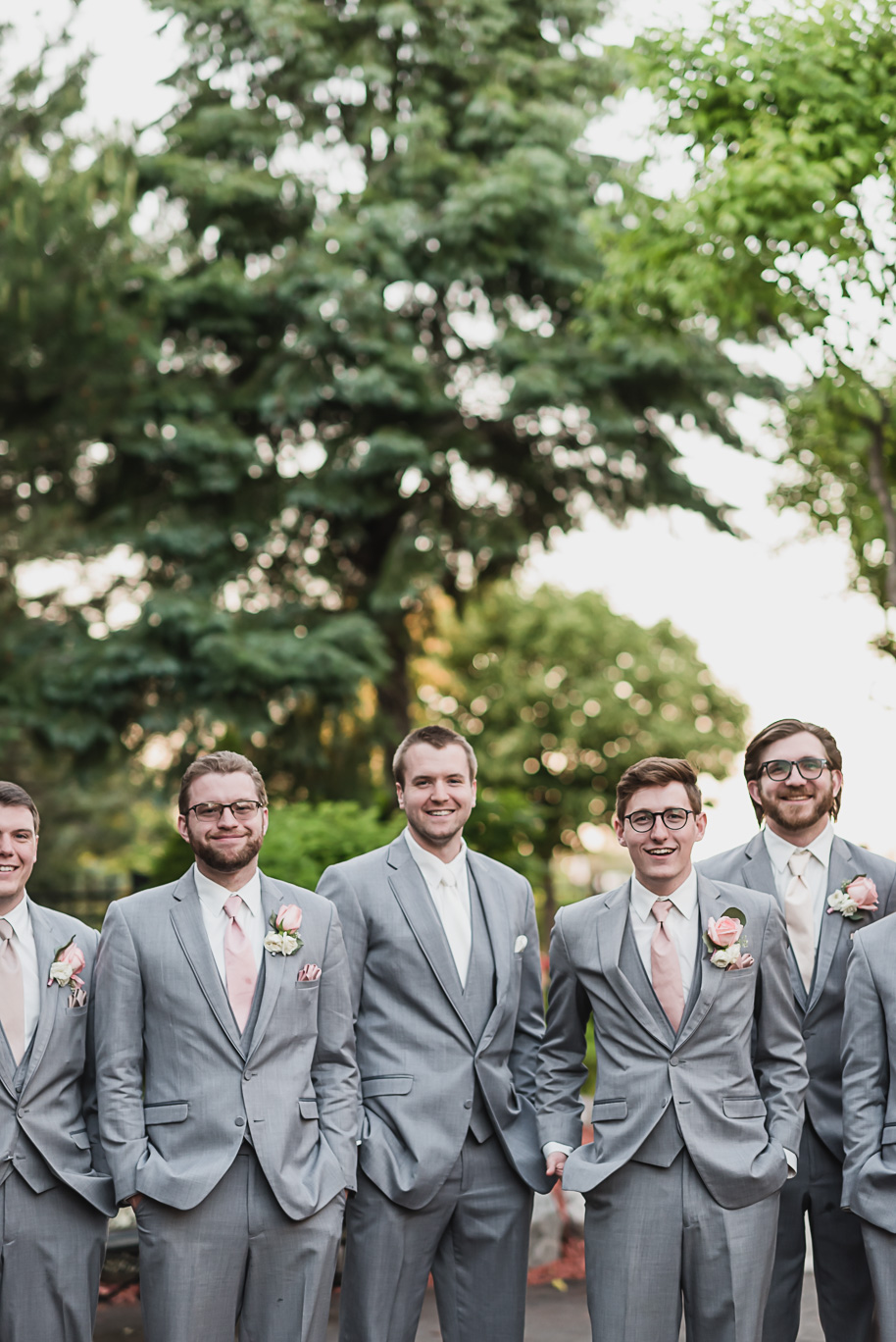 Summer pink and gray Crystal Gardens wedding in Southgate, Michigan provided by Kari Dawson, top-rated Michigan wedding photographer, and her team.
