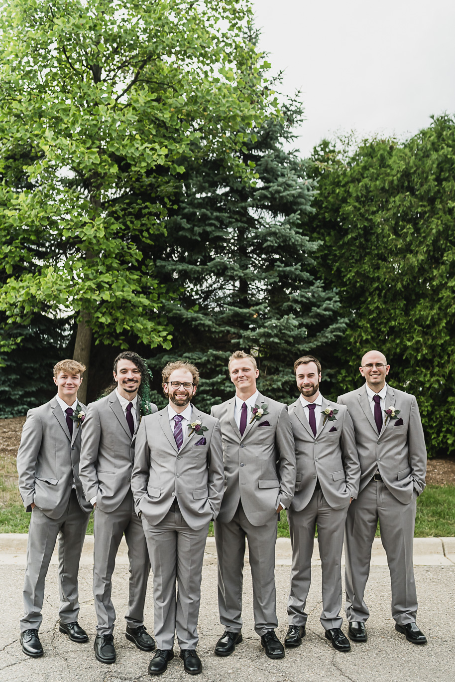 Summer purple and gray Petruzzellos wedding in Troy, Michigan provided by Kari Dawson, top-rated Rochester wedding photographer, and her team.
