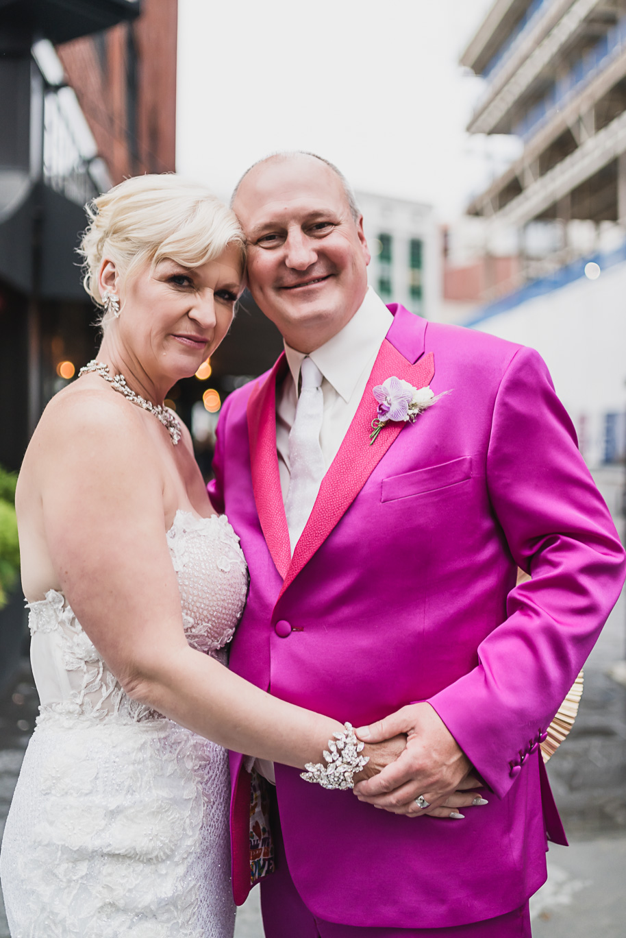 Colorful swanky black tie Shinola wedding at the Shinola Hotel in downtown Detroit, Michigan provided by Kari Dawson, top-rated Detroit wedding photographer and her team.