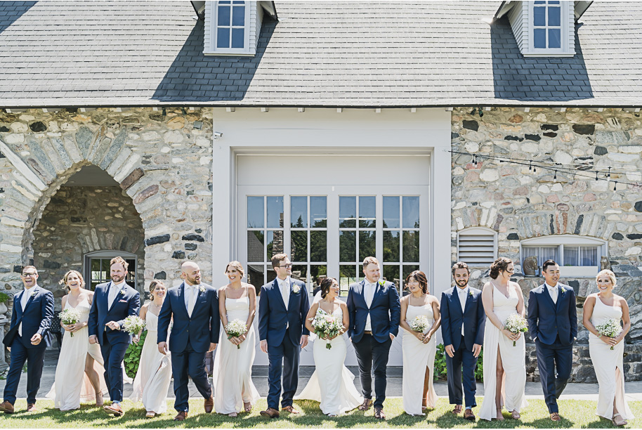 Blush and navy summer northern Michigan Castle Farms Wedding in Charlevoix, Michigan provided by Kari Dawson, top-rated northern Michigan wedding photographer, and her team.