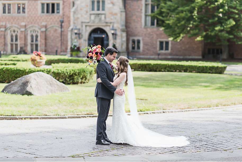 An outdoor summer Meadow Brook Hall wedding in Rochester, Michigan provided by Kari Dawson, top-rated Rochester wedding photographer her team.