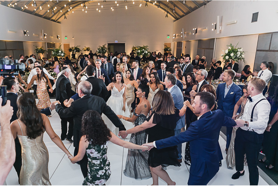 A classic black white and gold black-tie summer Jewish wedding at the CCS Taubman Center in downtown Detroit by Kari Dawson.