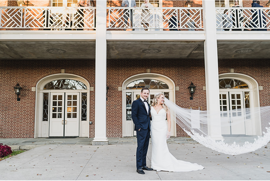 Fall dusty blue and black classic and glamorous Lovett Hall wedding at Greenfield Village in Dearborn, Michigan, provided by Kari Dawson top-rated Detroit wedding photographer and her team.