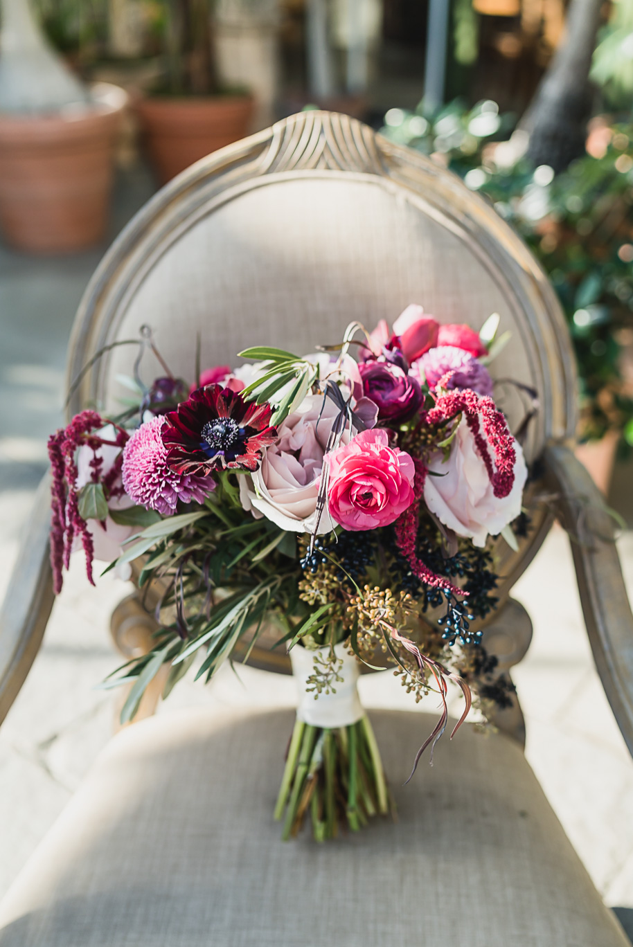 A winter Planterra garden wedding in Michigan by Kari Dawson, a Detroit wedding photographer for shy couples that want to look natural and their best.
