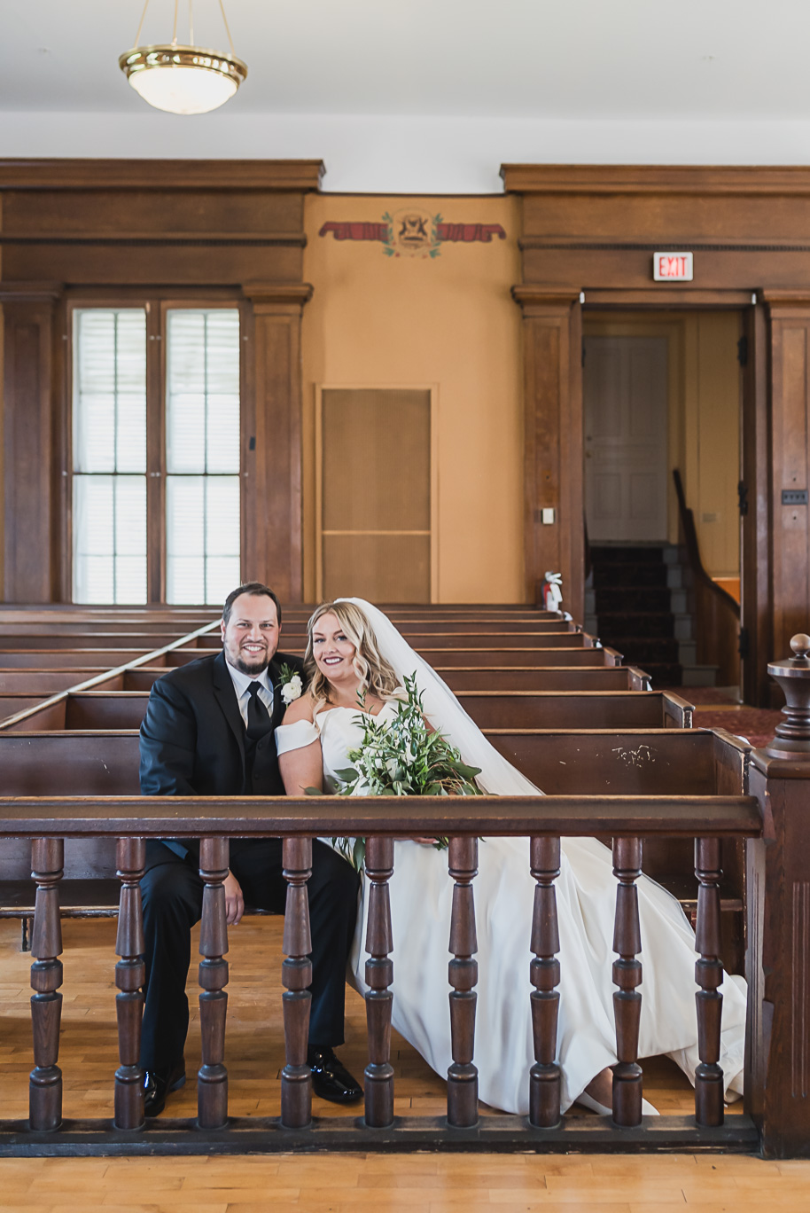 Lapeer historical courthouse micro wedding in Lapeer, Michigan provided by Kari Dawson, top-rated Michigan wedding photographer, and her team.