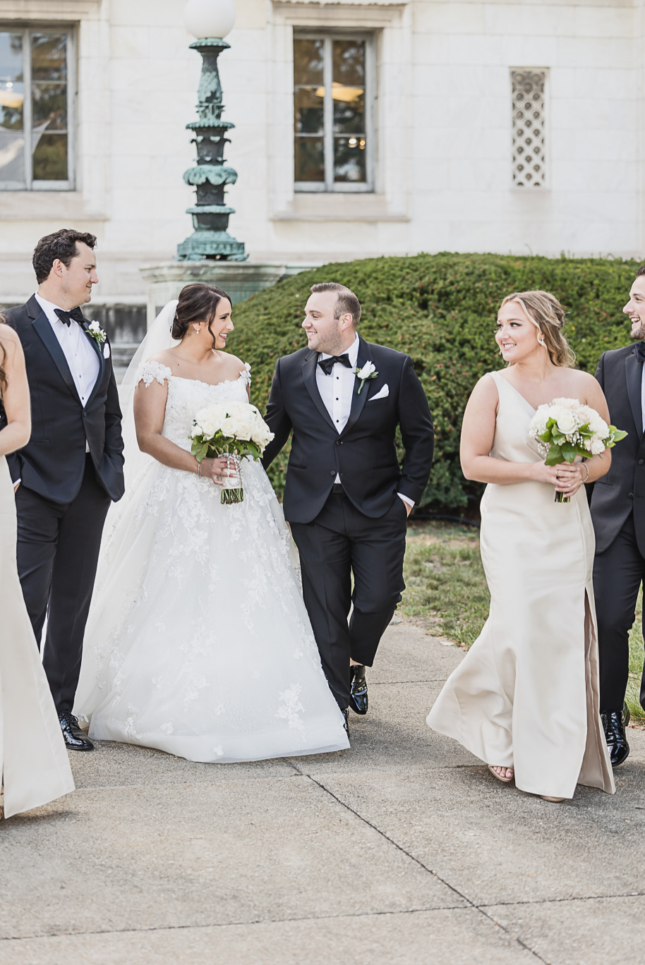 A classic black tie fall Italian wedding at Andiamo in Warren, Michigan provided by Kari Dawson, top-rated Detroit Wedding photographer, and her team.