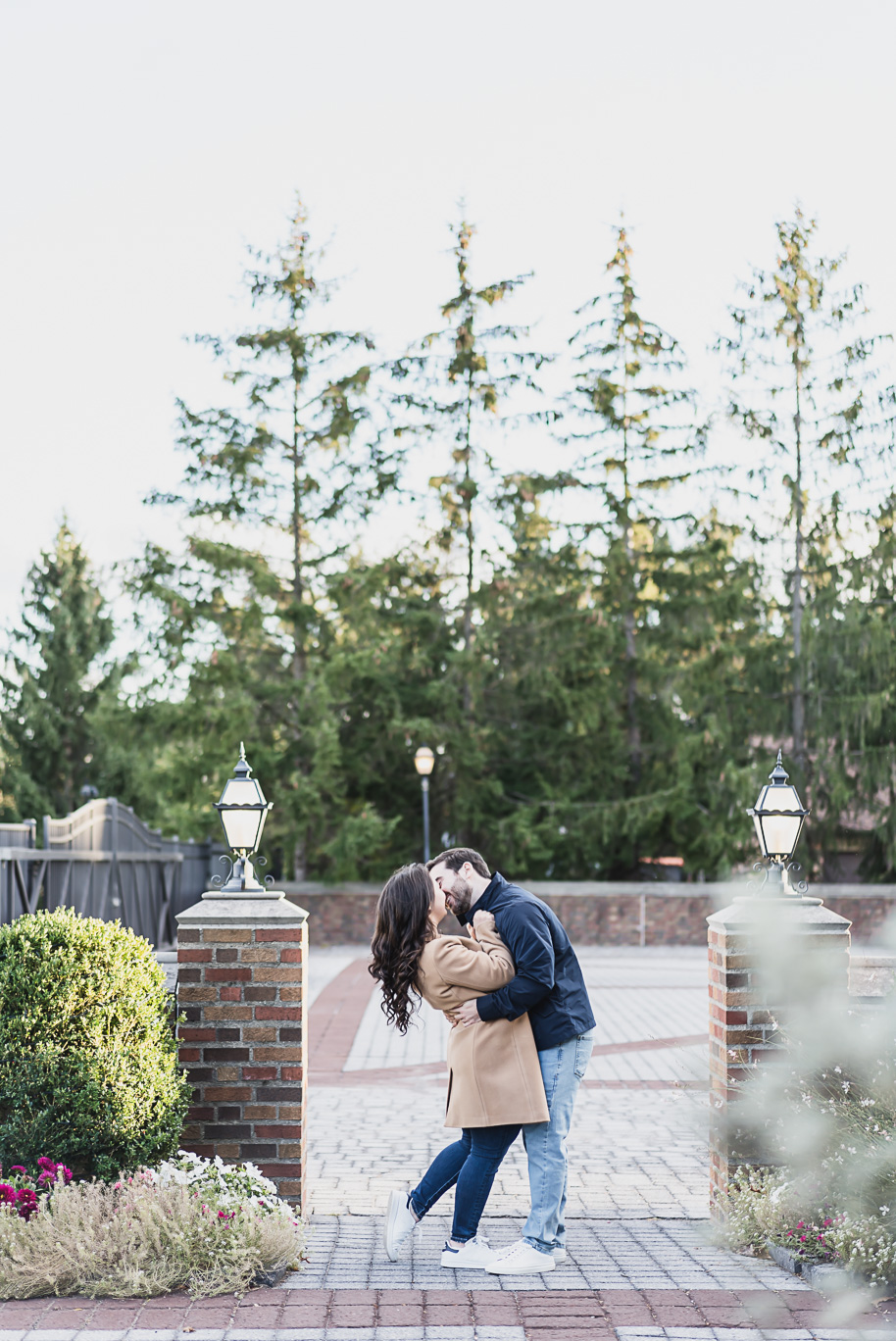 A fall Meadow Brook engagement session wrapped in the setting sun in Rochester, Michigan provided by Kari Dawson top-rated Rochester wedding photographer.