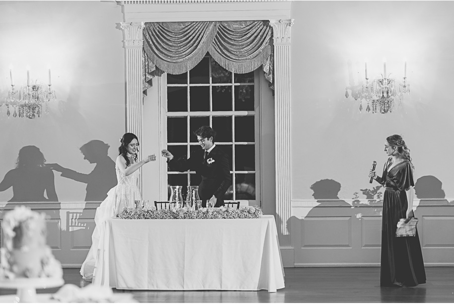 A classic and romantic winter Lovett Hall wedding at Greenfield Village in Dearborn Michigan provided by Kari Dawson top-rated Detroit wedding photographer.