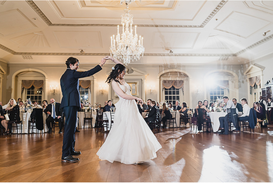 A classic and romantic winter Lovett Hall wedding at Greenfield Village in Dearborn Michigan provided by Kari Dawson top-rated Detroit wedding photographer.