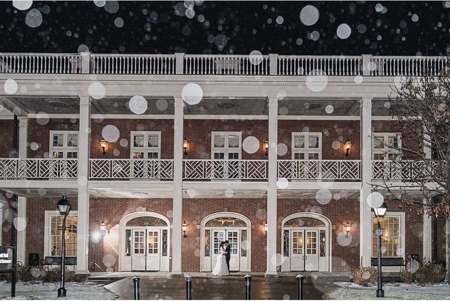 A classic and romantic winter Lovett Hall wedding at Greenfield Village in Dearborn Michigan provided by Kari Dawson top-rated Detroit wedding photographer.