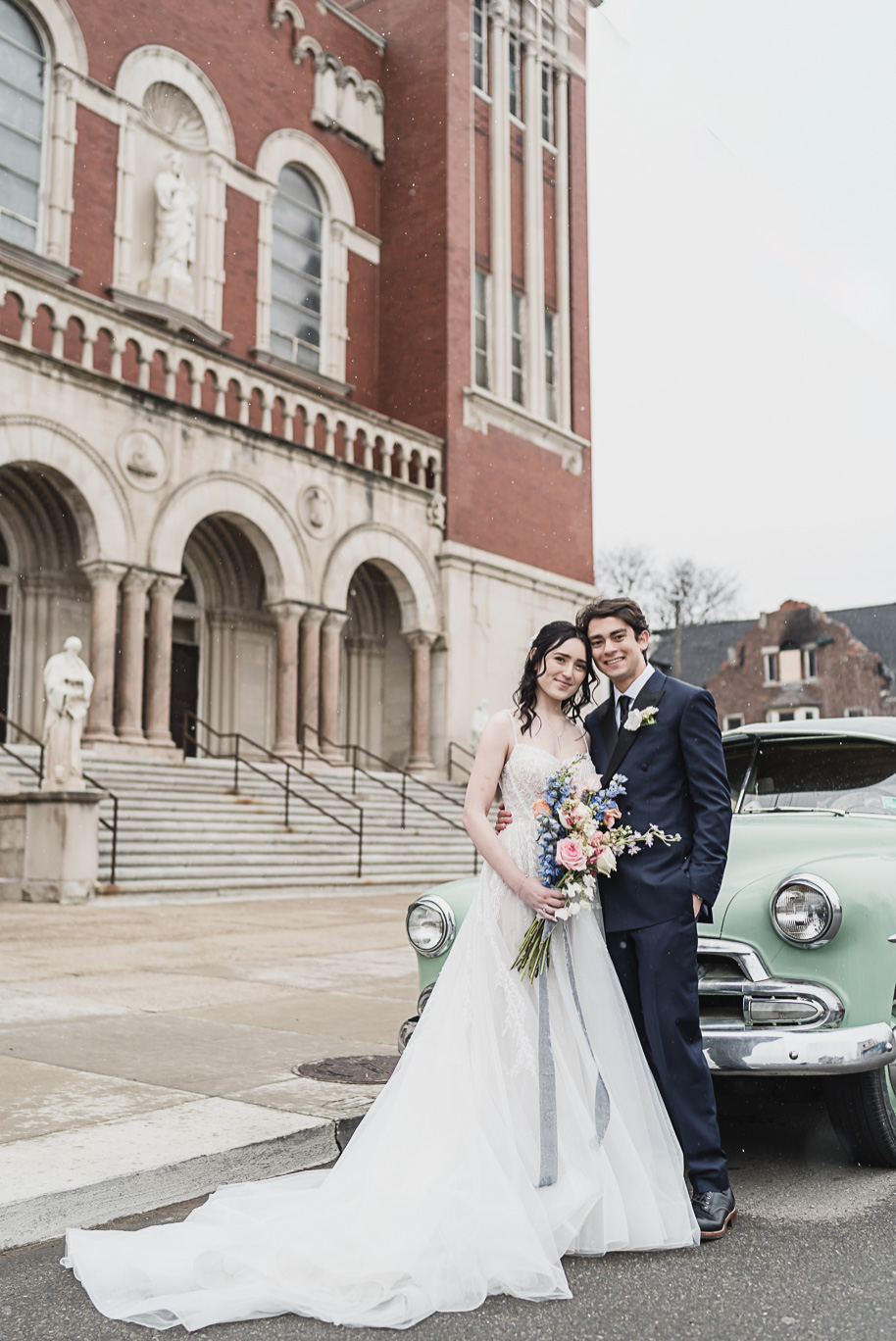 A classic and romantic winter Lovett Hall wedding at Greenfield Village in Dearborn Michigan provided by Kari Dawson top-rated Detroit wedding photographer.