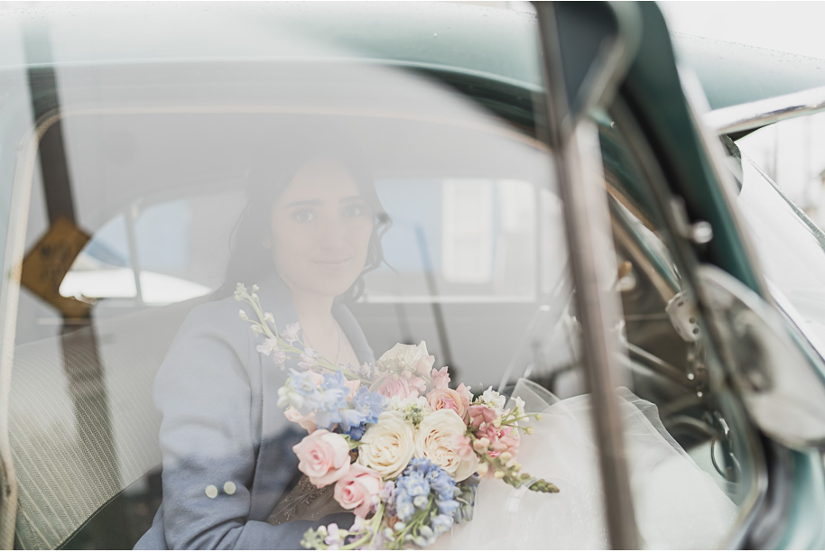 A classic and romantic winter Lovett Hall wedding at Greenfield Village in Dearborn Michigan provided by Kari Dawson top-rated Detroit wedding photographer.