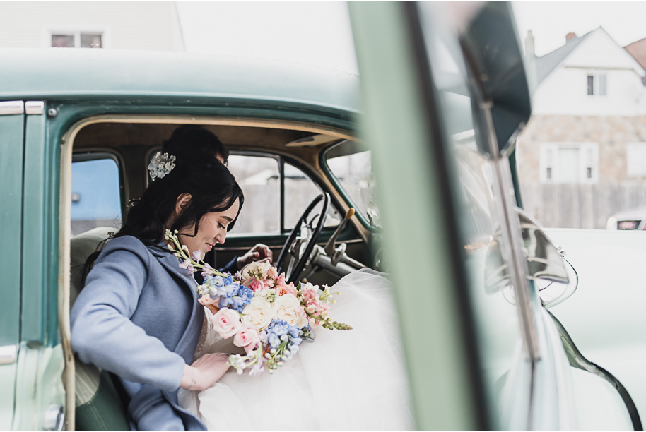 A classic and romantic winter Lovett Hall wedding at Greenfield Village in Dearborn Michigan provided by Kari Dawson top-rated Detroit wedding photographer.