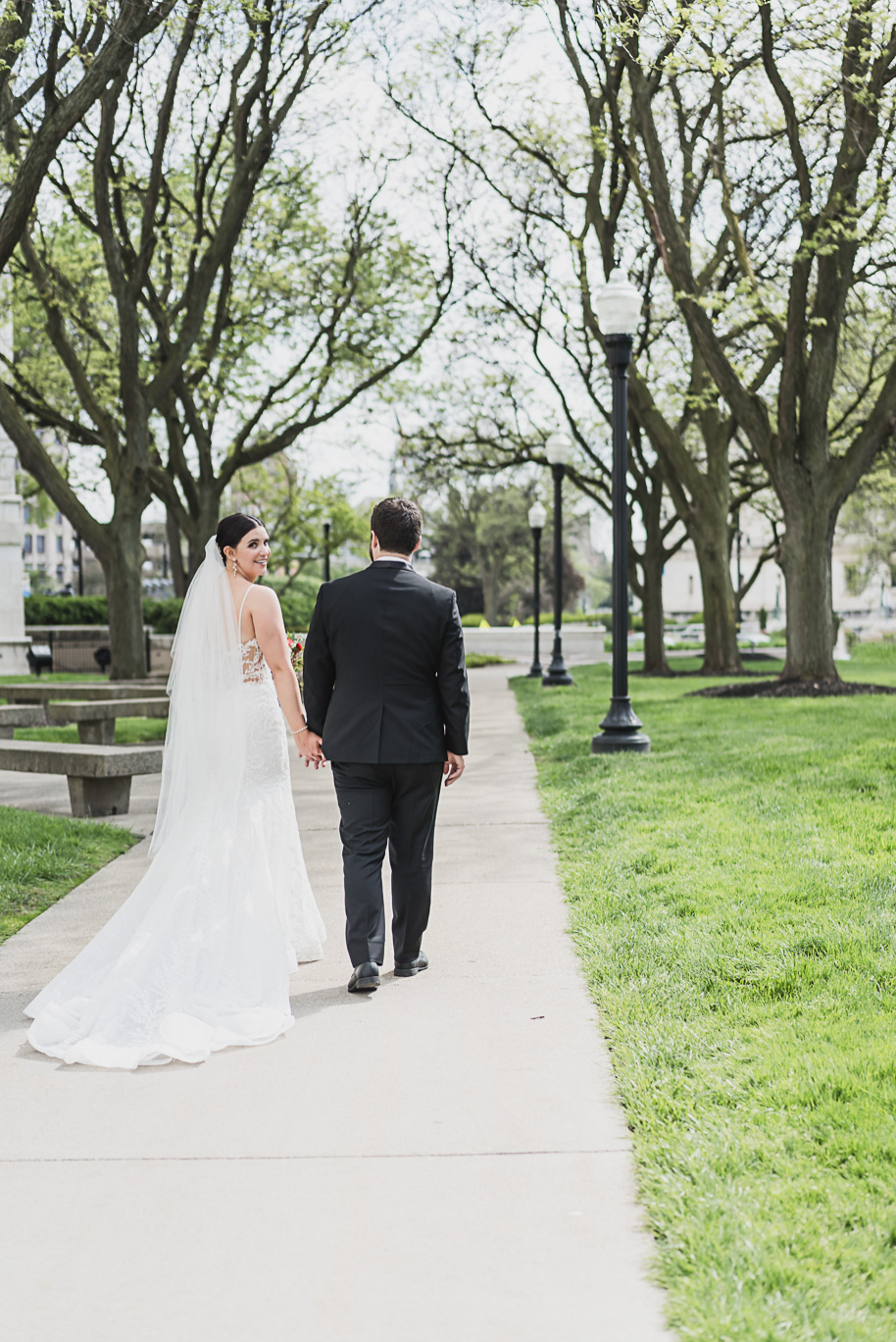 A vibrant classic Colony Club wedding in downtown Detroit Michigan provided by Kari Dawson, top-rated Detroit wedding photographer, and her team.