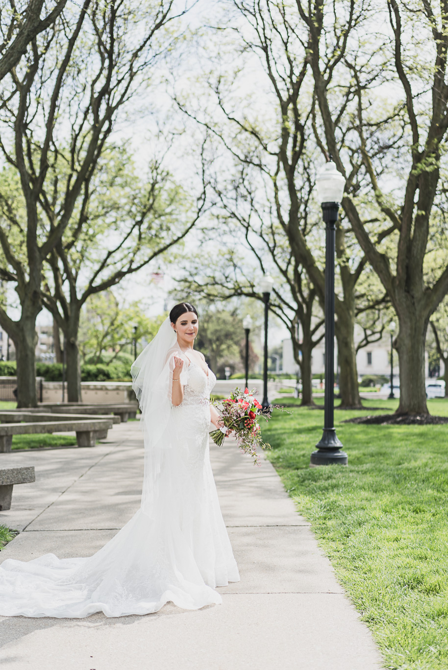 A vibrant classic Colony Club wedding in downtown Detroit Michigan provided by Kari Dawson, top-rated Detroit wedding photographer, and her team.