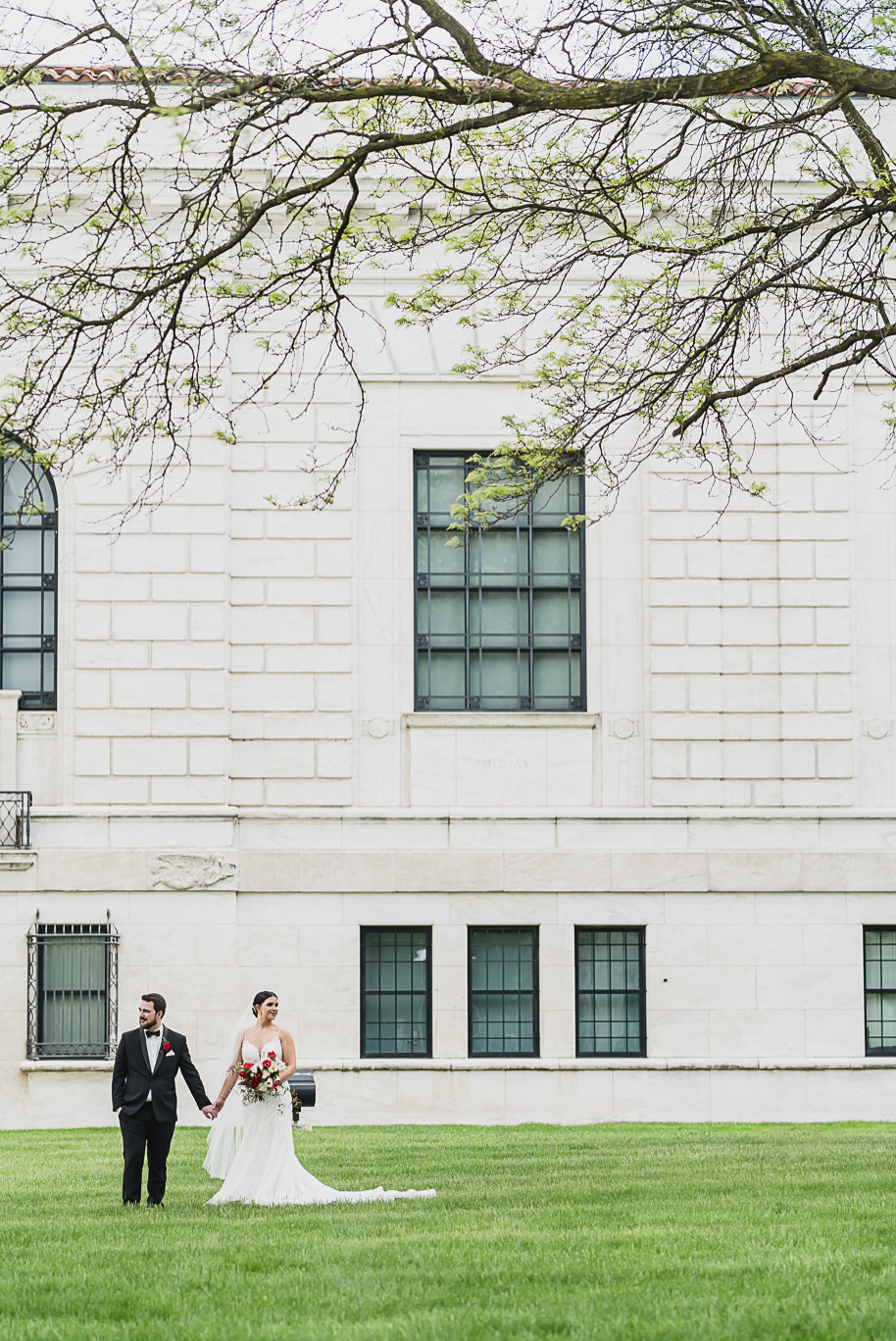 A vibrant classic Colony Club wedding in downtown Detroit Michigan provided by Kari Dawson, top-rated Detroit wedding photographer, and her team.