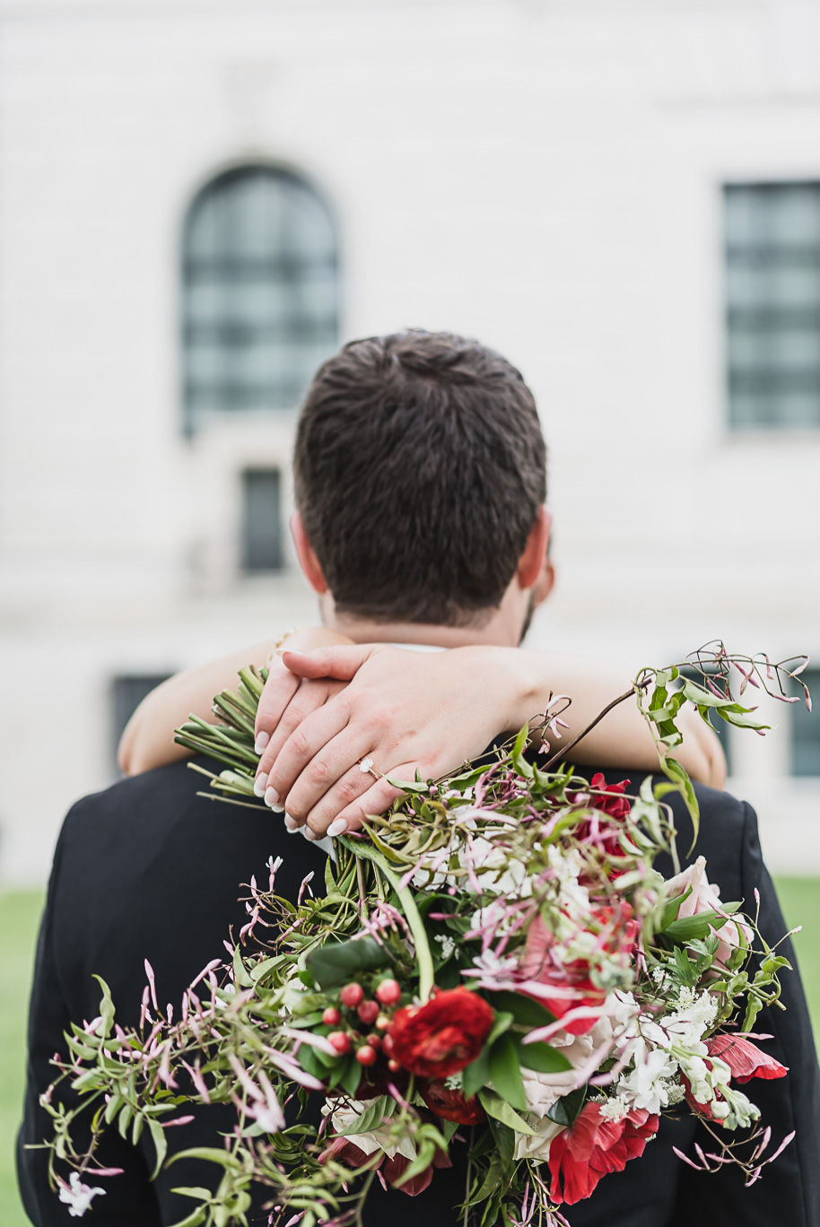 A vibrant classic Colony Club wedding in downtown Detroit Michigan provided by Kari Dawson, top-rated Detroit wedding photographer, and her team.