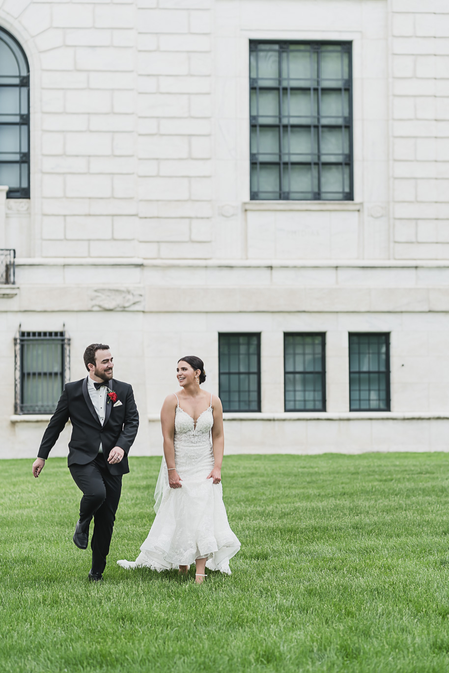 A vibrant classic Colony Club wedding in downtown Detroit Michigan provided by Kari Dawson, top-rated Detroit wedding photographer, and her team.