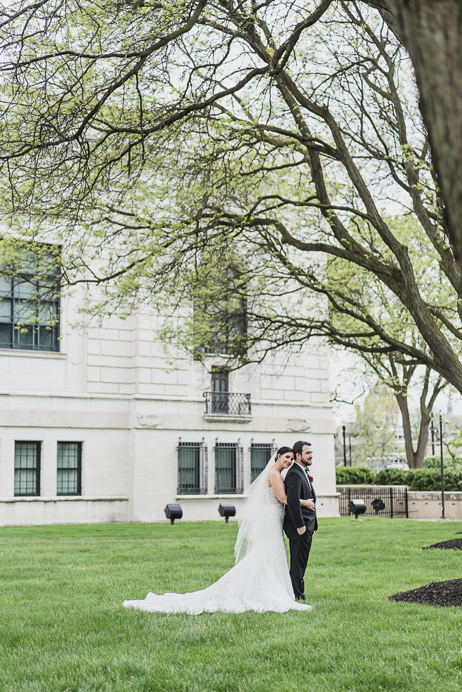 A vibrant classic Colony Club wedding in downtown Detroit Michigan provided by Kari Dawson, top-rated Detroit wedding photographer, and her team.