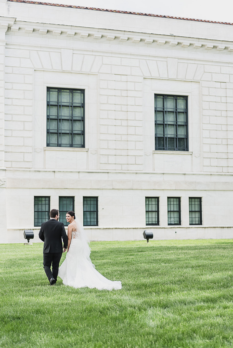 A vibrant classic Colony Club wedding in downtown Detroit Michigan provided by Kari Dawson, top-rated Detroit wedding photographer, and her team.