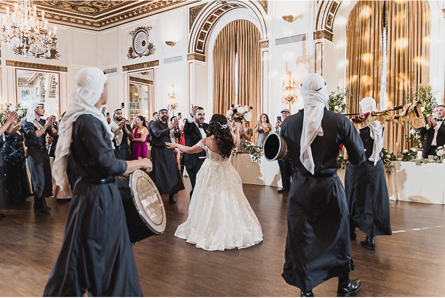 A classic black-tie summer Palestinian wedding in Detroit at the Colony Club by Kari Dawson, top-rated Detroit wedding photographer, and her team.