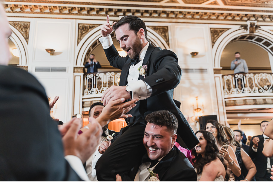 A classic black-tie summer Palestinian wedding in Detroit at the Colony Club by Kari Dawson, top-rated Detroit wedding photographer, and her team.