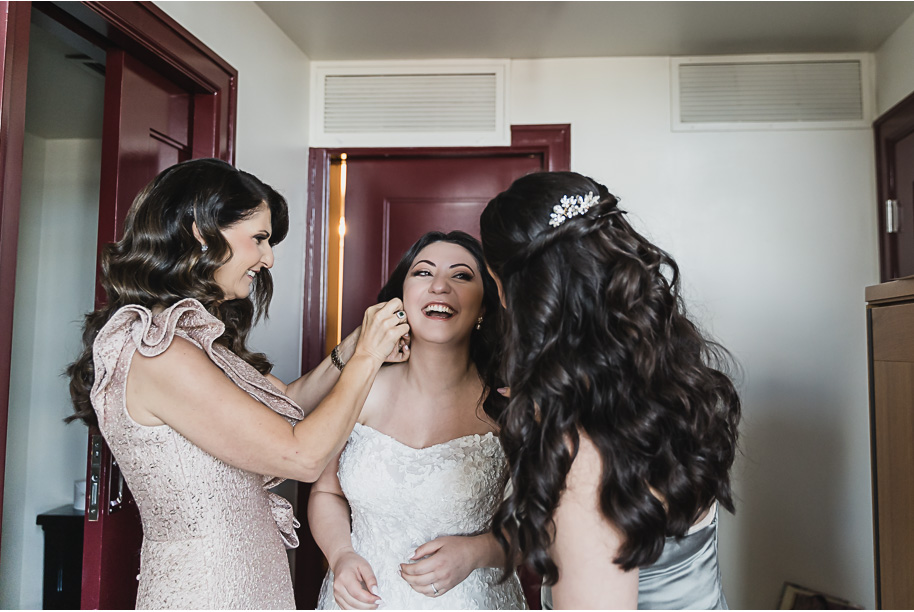 A classic black-tie summer Palestinian wedding in Detroit at the Colony Club by Kari Dawson, top-rated Detroit wedding photographer, and her team.