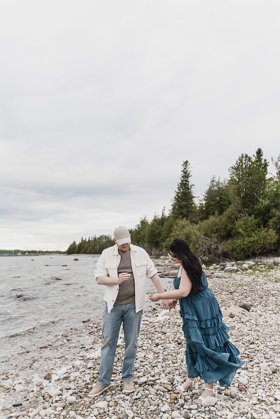 A northern Michigan engagement session on Lake Huron in Presque Isle by top-rated Norhtern Michigan wedding photographer, Kari Dawson.