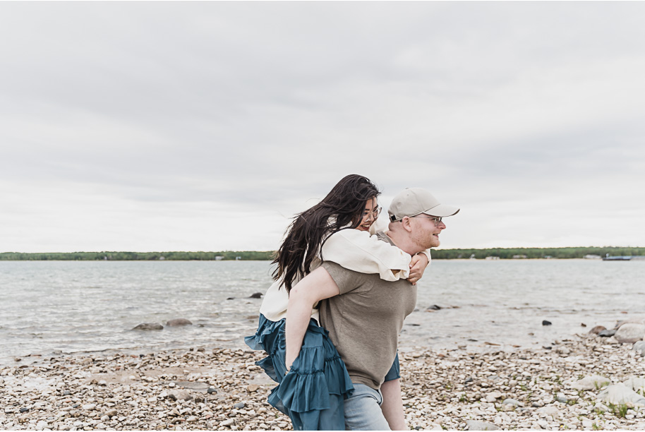 A northern Michigan engagement session on Lake Huron in Presque Isle by top-rated Norhtern Michigan wedding photographer, Kari Dawson.