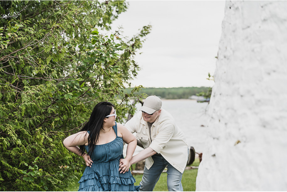 A northern Michigan engagement session on Lake Huron in Presque Isle by top-rated Norhtern Michigan wedding photographer, Kari Dawson.