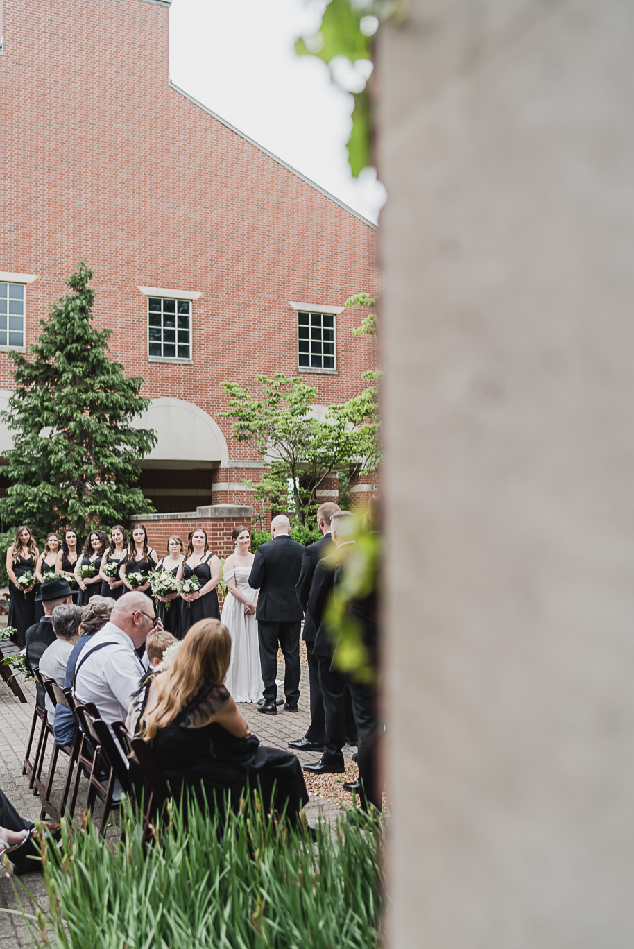 A spring black and white Lovett Hall wedding at Greenfield Village in Dearborn, Michigan provided by Kari Dawson Photography.