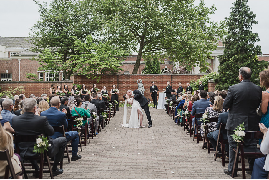 A spring black and white Lovett Hall wedding at Greenfield Village in Dearborn, Michigan provided by Kari Dawson Photography.