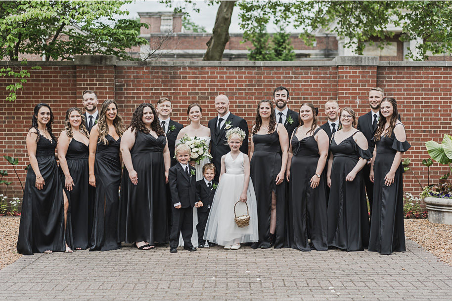 A spring black and white Lovett Hall wedding at Greenfield Village in Dearborn, Michigan provided by Kari Dawson Photography.