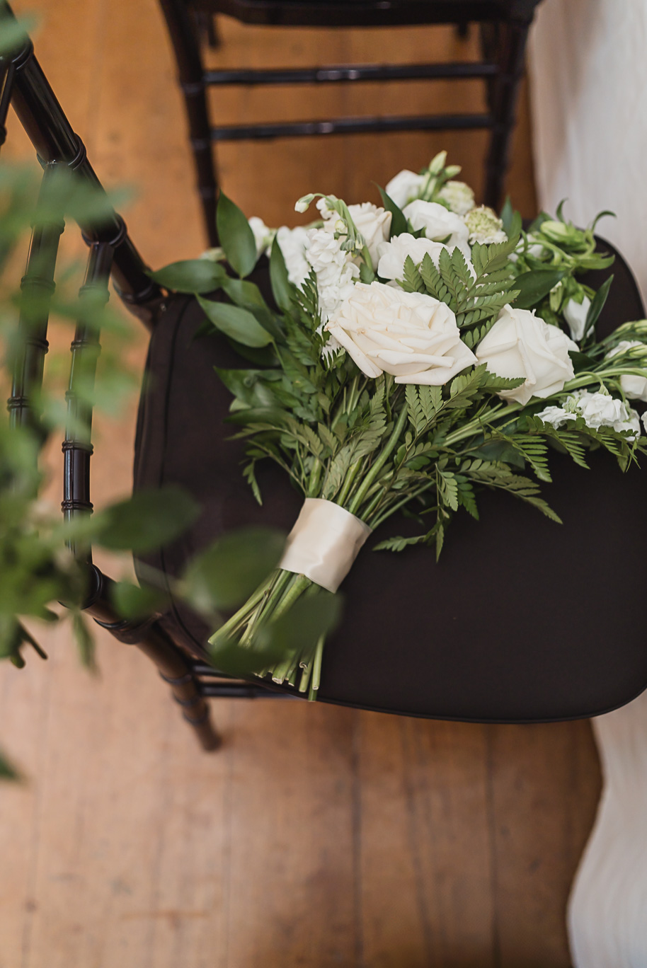 A spring black and white Lovett Hall wedding at Greenfield Village in Dearborn, Michigan provided by Kari Dawson Photography.