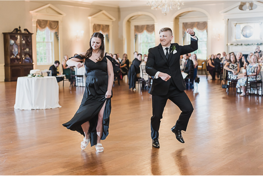 A spring black and white Lovett Hall wedding at Greenfield Village in Dearborn, Michigan provided by Kari Dawson Photography.