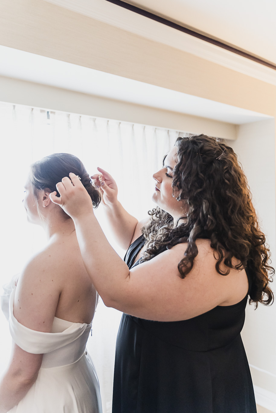 A spring black and white Lovett Hall wedding at Greenfield Village in Dearborn, Michigan provided by Kari Dawson Photography.