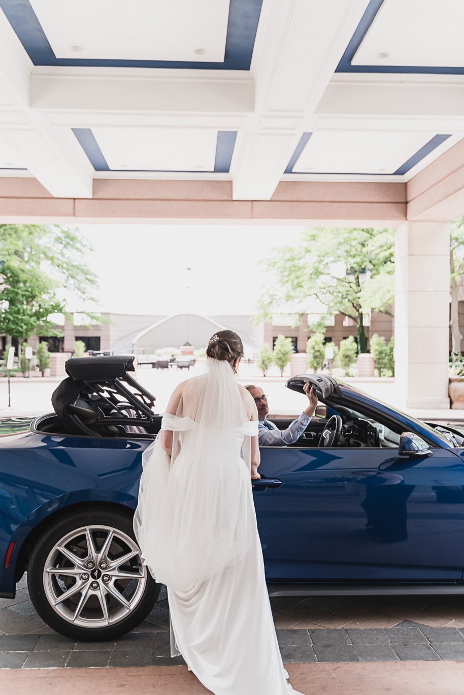 A spring black and white Lovett Hall wedding at Greenfield Village in Dearborn, Michigan provided by Kari Dawson Photography.