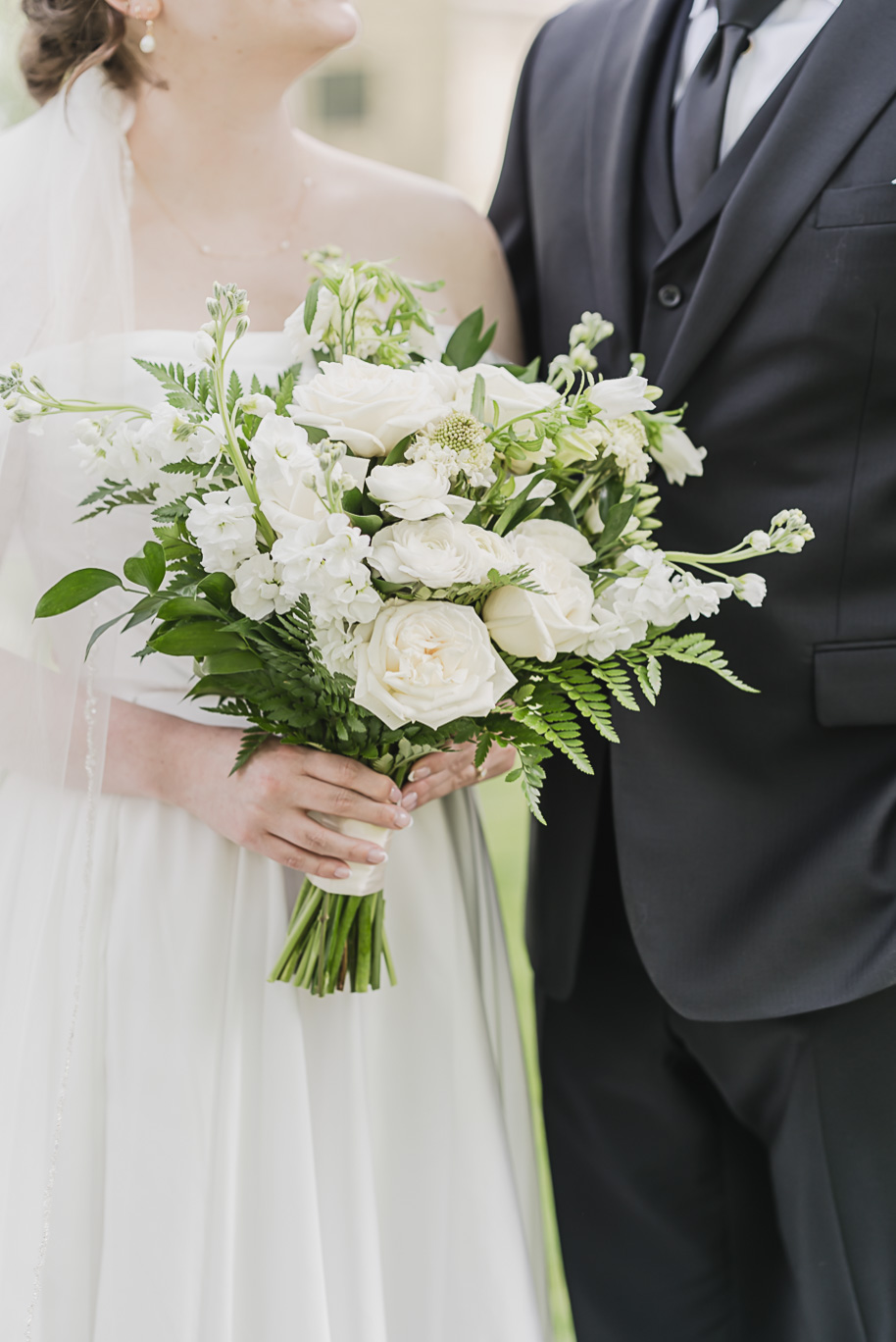 A spring black and white Lovett Hall wedding at Greenfield Village in Dearborn, Michigan provided by Kari Dawson Photography.