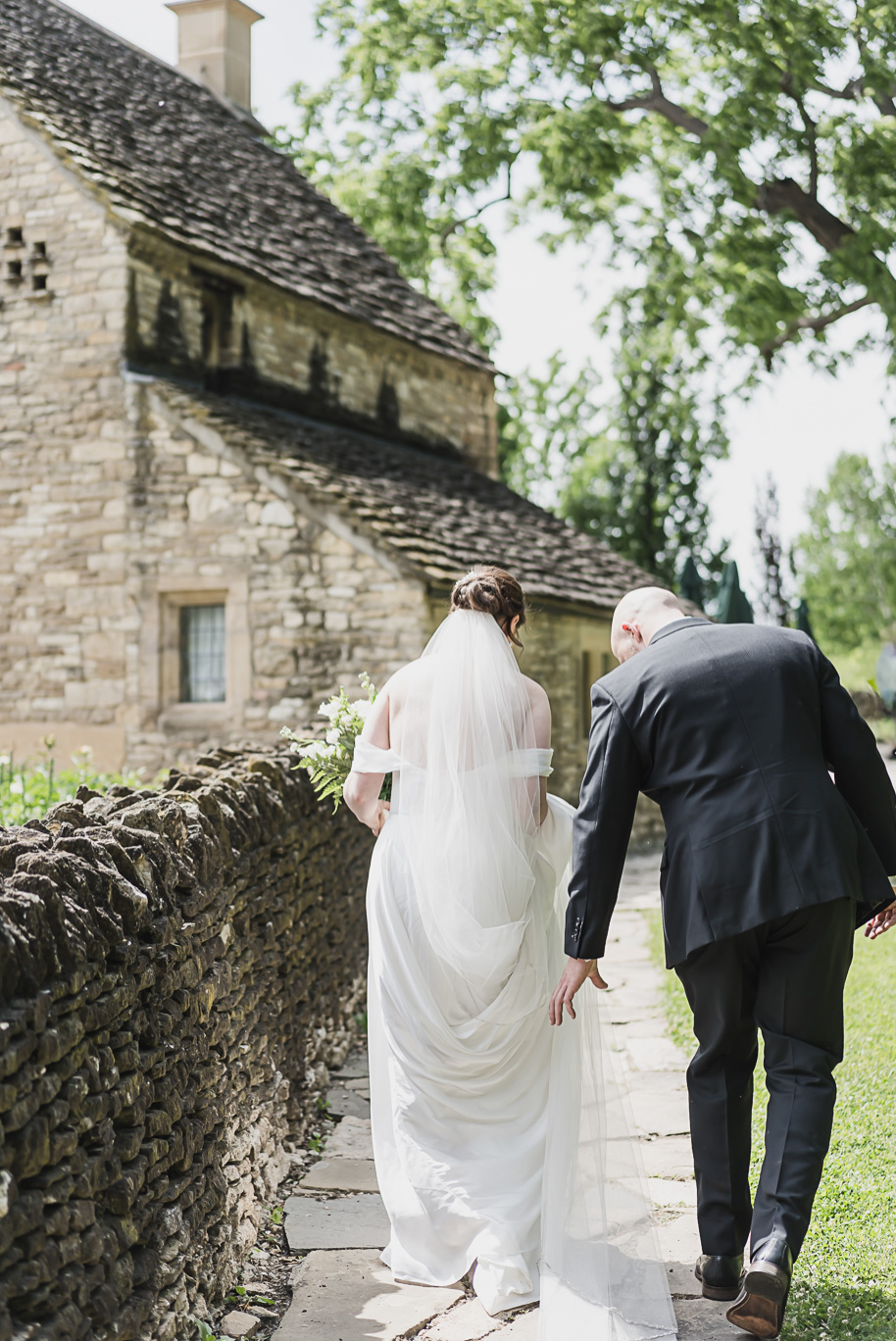 A spring black and white Lovett Hall wedding at Greenfield Village in Dearborn, Michigan provided by Kari Dawson Photography.