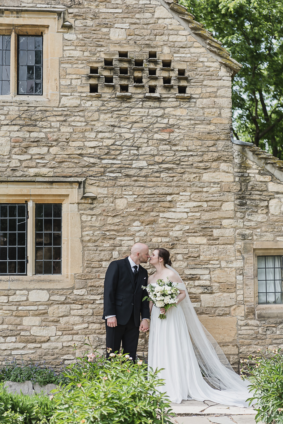 A spring black and white Lovett Hall wedding at Greenfield Village in Dearborn, Michigan provided by Kari Dawson Photography.