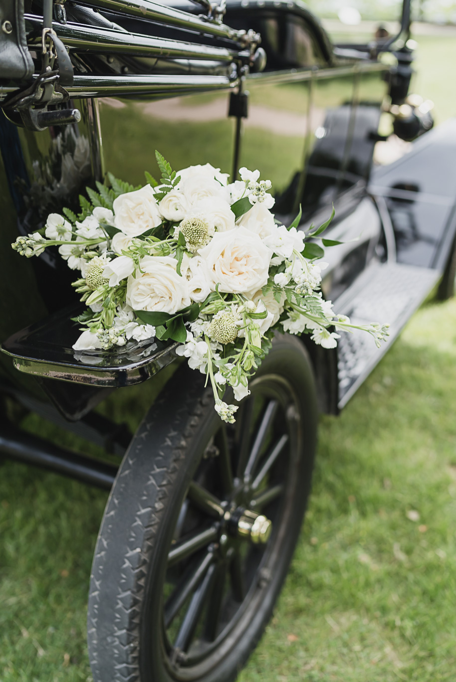 A spring black and white Lovett Hall wedding at Greenfield Village in Dearborn, Michigan provided by Kari Dawson Photography.