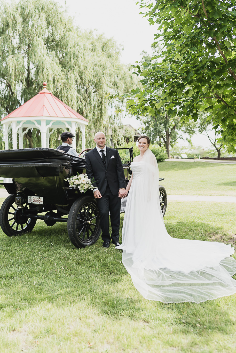 A spring black and white Lovett Hall wedding at Greenfield Village in Dearborn, Michigan provided by Kari Dawson Photography.