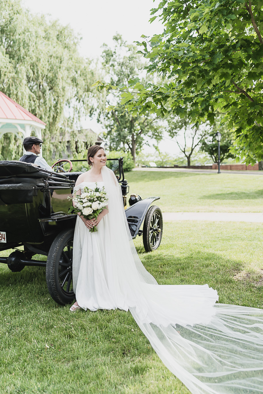 A spring black and white Lovett Hall wedding at Greenfield Village in Dearborn, Michigan provided by Kari Dawson Photography.