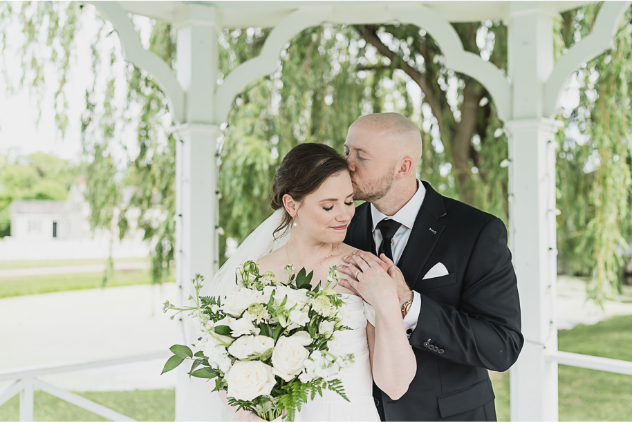 A spring black and white Lovett Hall wedding at Greenfield Village in Dearborn, Michigan provided by Kari Dawson Photography.