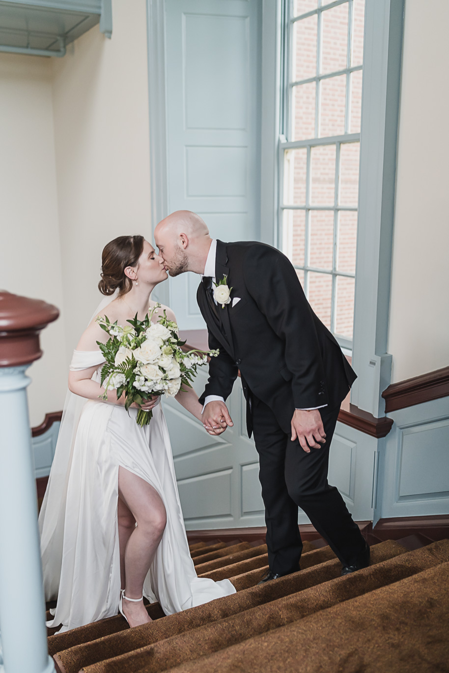 A spring black and white Lovett Hall wedding at Greenfield Village in Dearborn, Michigan provided by Kari Dawson Photography.