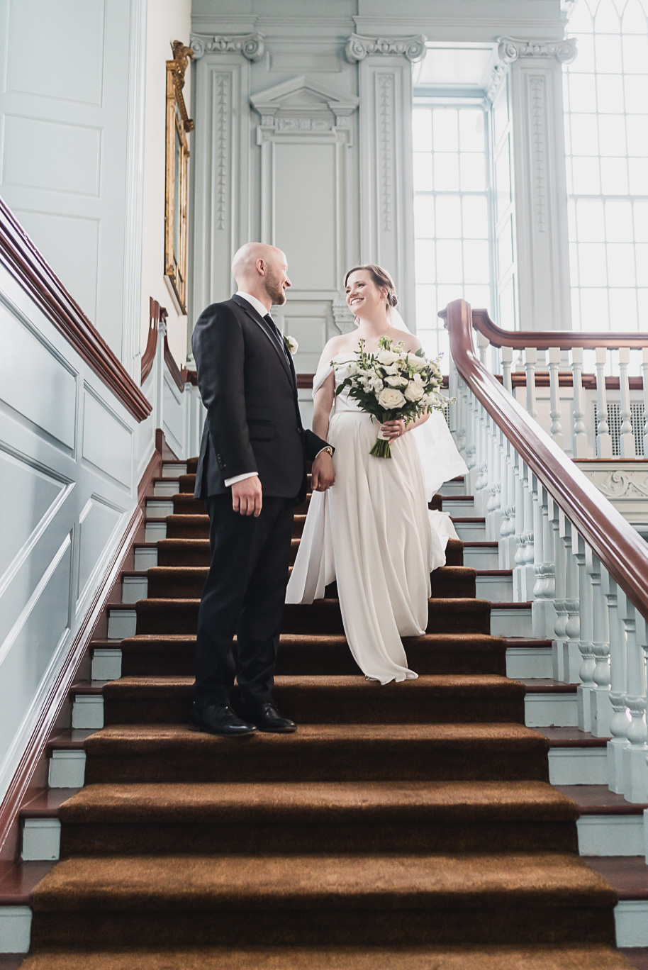 A spring black and white Lovett Hall wedding at Greenfield Village in Dearborn, Michigan provided by Kari Dawson Photography.