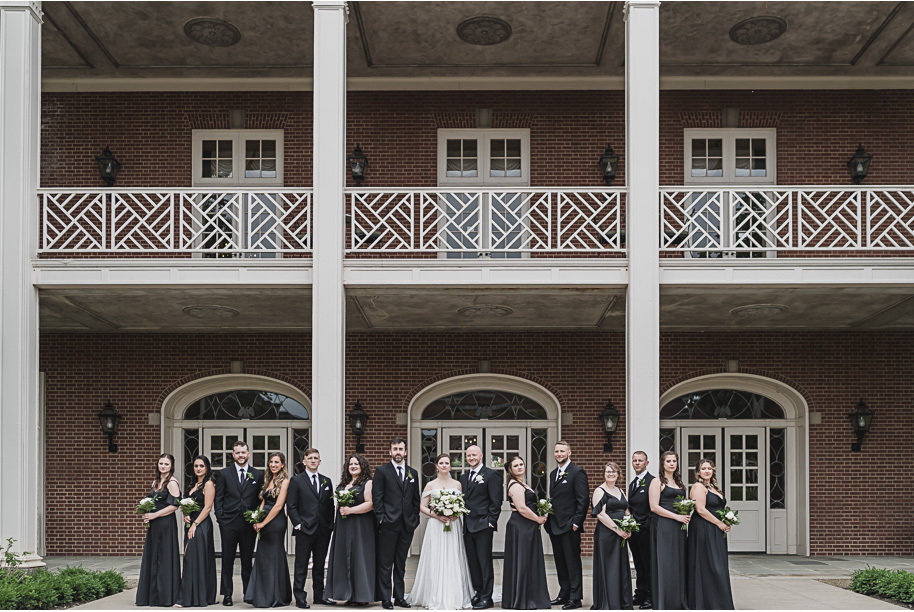 A spring black and white Lovett Hall wedding at Greenfield Village in Dearborn, Michigan provided by Kari Dawson Photography.