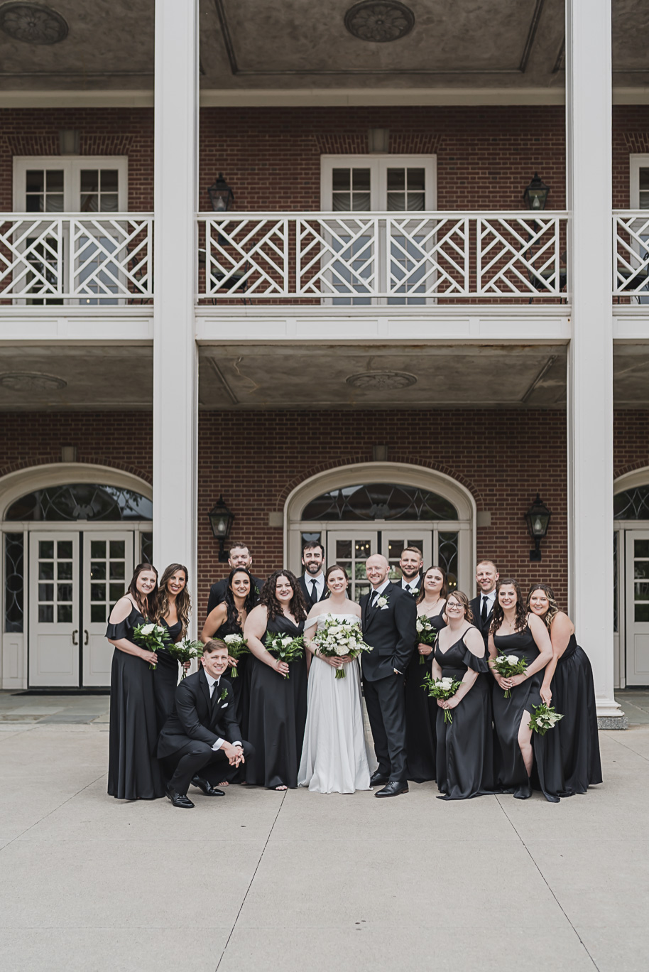 A spring black and white Lovett Hall wedding at Greenfield Village in Dearborn, Michigan provided by Kari Dawson Photography.